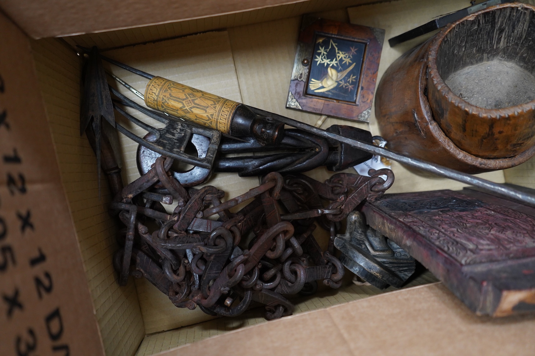 A collection of Burmese items to include wood weaving block, two figural weaving pulleys, two arrow heads and two trunk pots